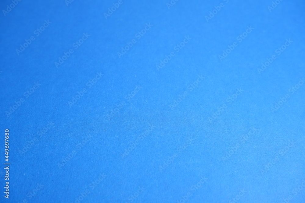 Blue background. Blue cardboard texture. Blue background. Blue cardboard texture.