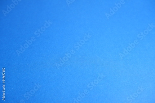 Blue background. Blue cardboard texture.