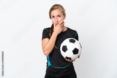 Fototapeta Naklejka Na Ścianę i Meble -  Young football player woman isolated on white background thinking