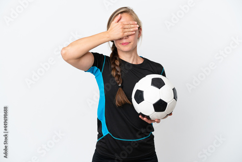 Fototapeta Naklejka Na Ścianę i Meble -  Young football player woman isolated on white background covering eyes by hands. Do not want to see something