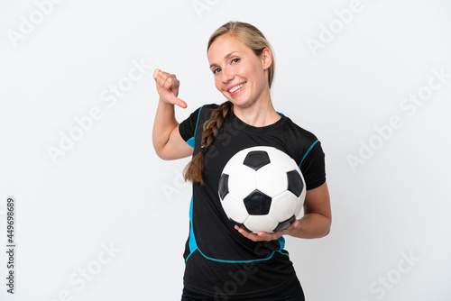 Young football player woman isolated on white background proud and self-satisfied © luismolinero