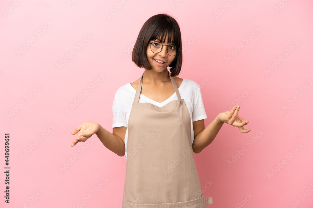 Restaurant waiter over isolated pink background having doubts Restaurant waiter over isolated pink background having doubts