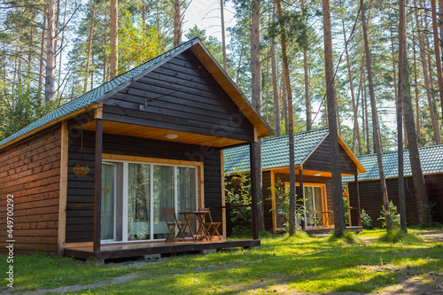 Beautiful tourist wooden houses. Tourist base. Beautiful veranda. Summer vacation.