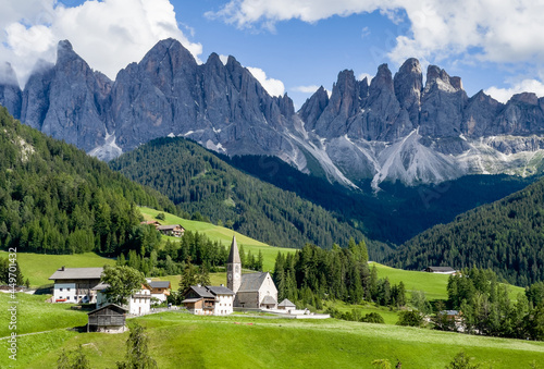 Santa Maddalena village view with stunning picturesque Dolomite Alps peaks in Val di Funes valley, South Tyrol, Italy.