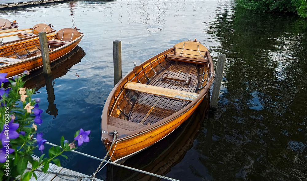 Rowing boats out of wood on a lake
