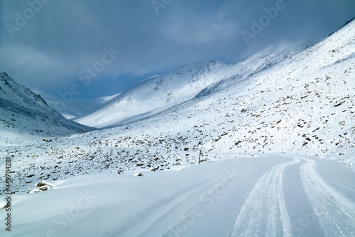 Snowy winter road leading up to the mighty Khardung La pass (over 5300 m)