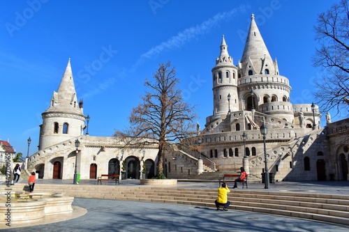 The Halászbástya or Fisherman's Bastion is a terrace in neo-Gothic and neo-Romanesque style situated on the Castle hill in Budapest, HANGARY. photo