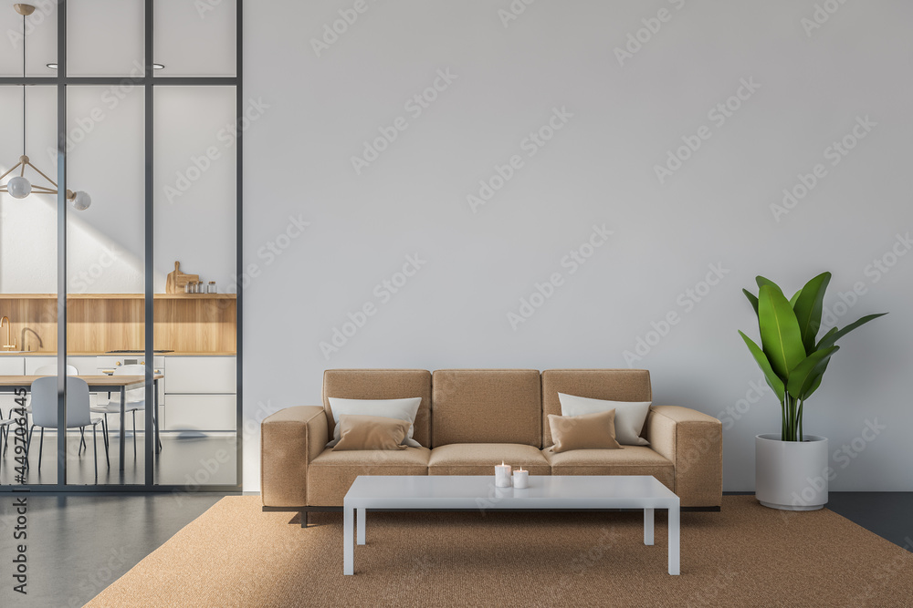 Fototapeta premium White and beige seating area with a sofa