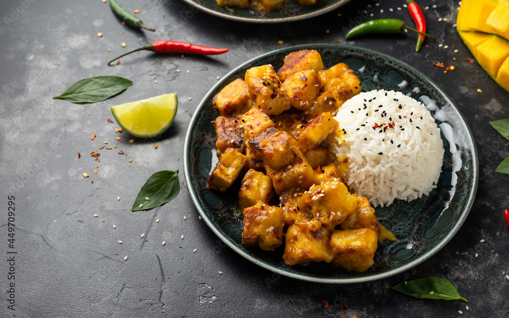 Mango Sticky tofu with jasmine rice and Thai basil Mango Sticky tofu with jasmine rice and Thai basil