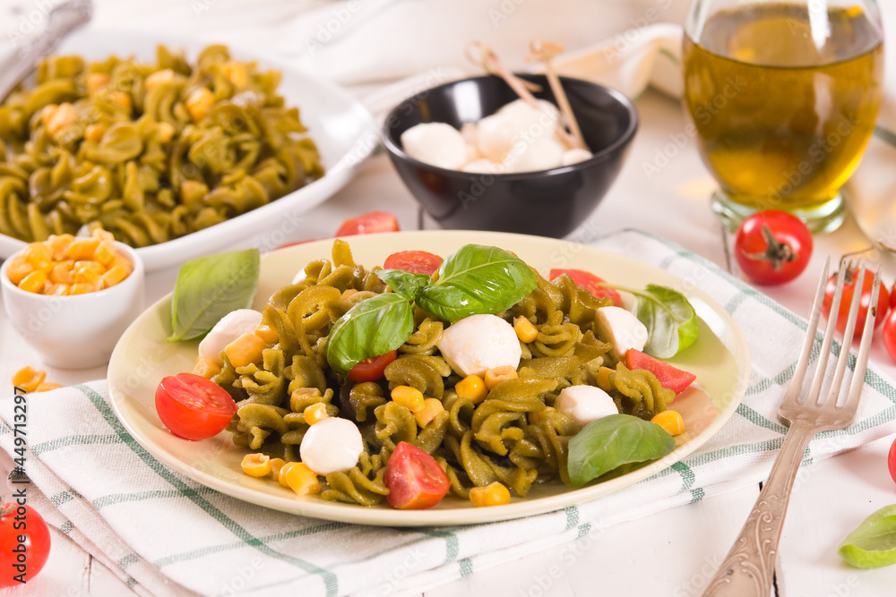 Fusilli pasta with cherry tomatoes and sweet corn. Fusilli pasta with cherry tomatoes and sweet corn.