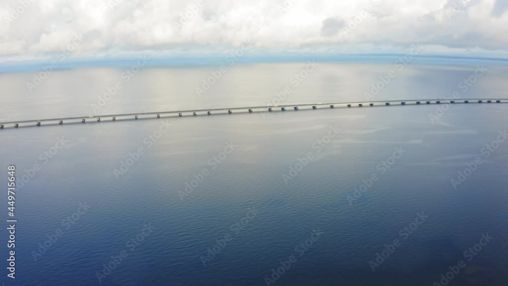 Drone view of a modern low-water bridge across the sea in Vladivostok Drone view of a modern low-water bridge across the sea in Vladivostok