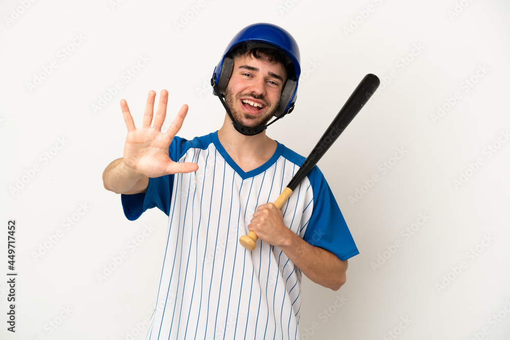 Young caucasian man playing baseball isolated on white background counting five with fingers Young caucasian man playing baseball isolated on white background counting five with fingers