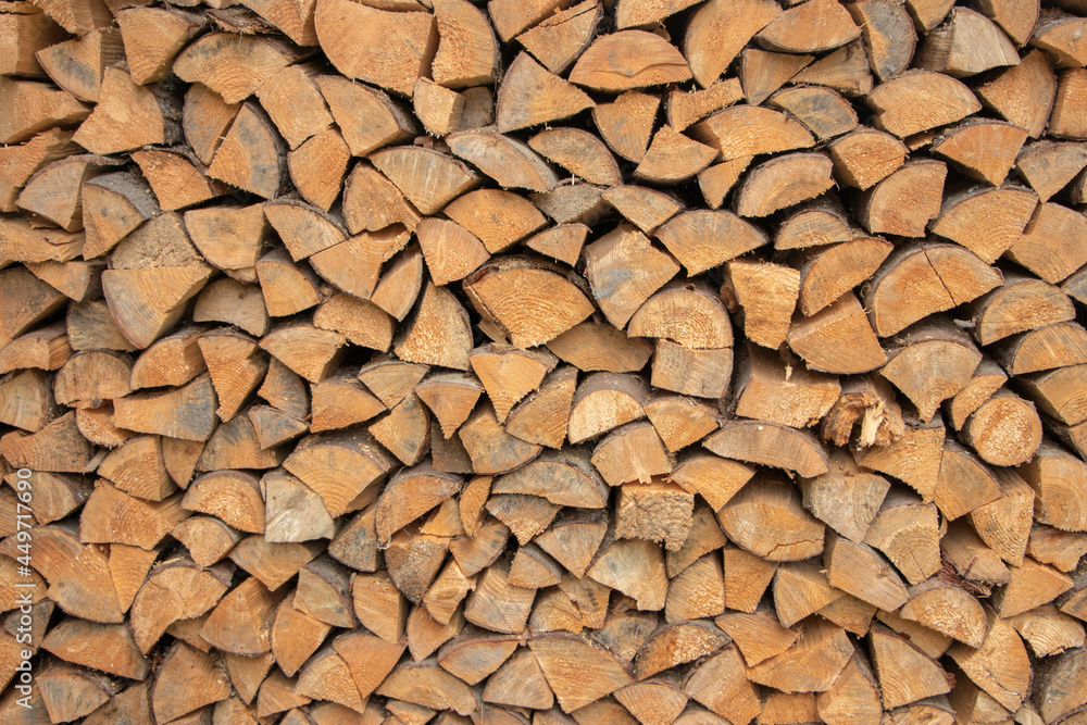 wall firewood , Background of dry chopped firewood logs in a pile wall firewood , Background of dry chopped firewood logs in a pile