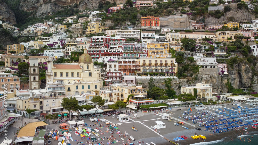 Panoramic aerial view of Positano coastline from a moving drone, Campania - Italy.