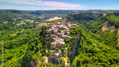 Cuadro en lienzo Panoramic aerial view of Civita di Bagnoregio from a flying drone around the medieval city, Italy