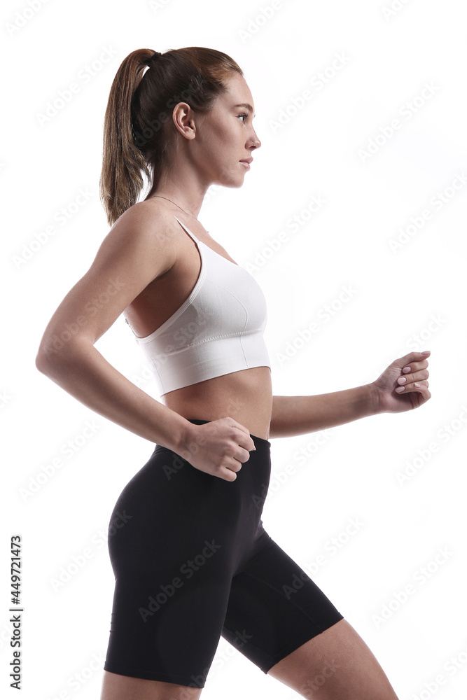Portrait of a running sportive woman. Isolated over white background. Portrait of a running sportive woman. Isolated over white background.