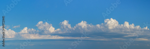 Photography Panorama of a cloudy sky with cumulus fluffy clouds