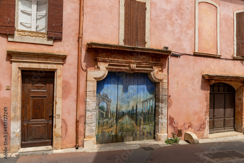 Painted door in the village of Roussillon in Luberon, Provence, south of France
