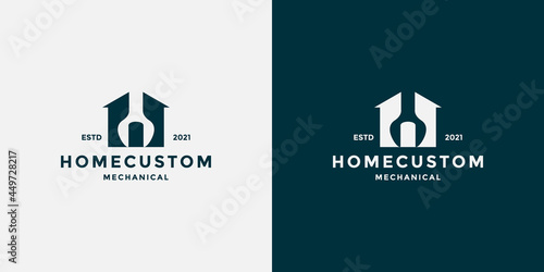 workshop logo design. house with wrench combination