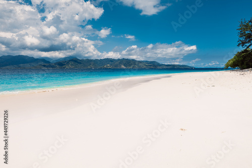 Fototapeta Naklejka Na Ścianę i Meble -  Tropical white sand beach and blue ocean in tropics