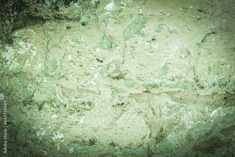 old brick wall. cracked concrete. Green tide, celadon green texture. vintage background. rustic style, mold.