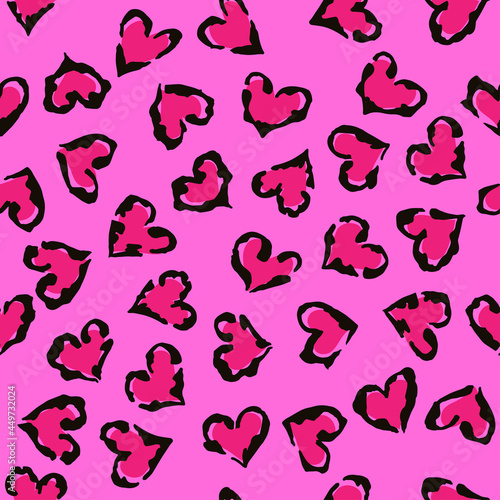 Leopard heart seamless pattern. Vector animal print. Black and magenta spots on pink background. Jaguar, leopard, cheetah, panther fur. Leopard skin imitation can be painted on clothes or fabric.