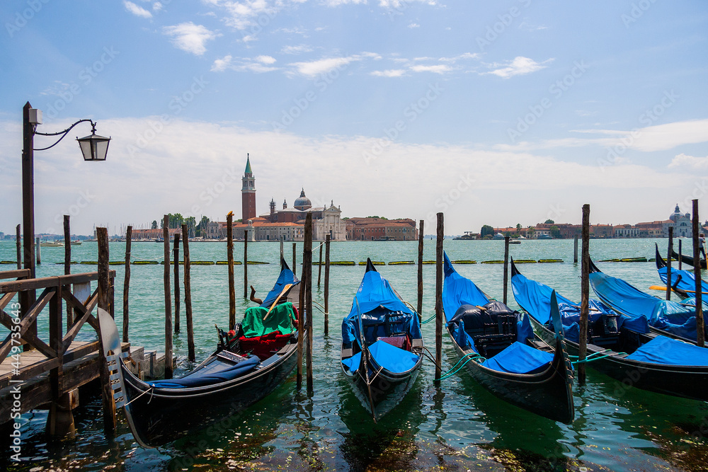 Venice, view of the pier with gondolas