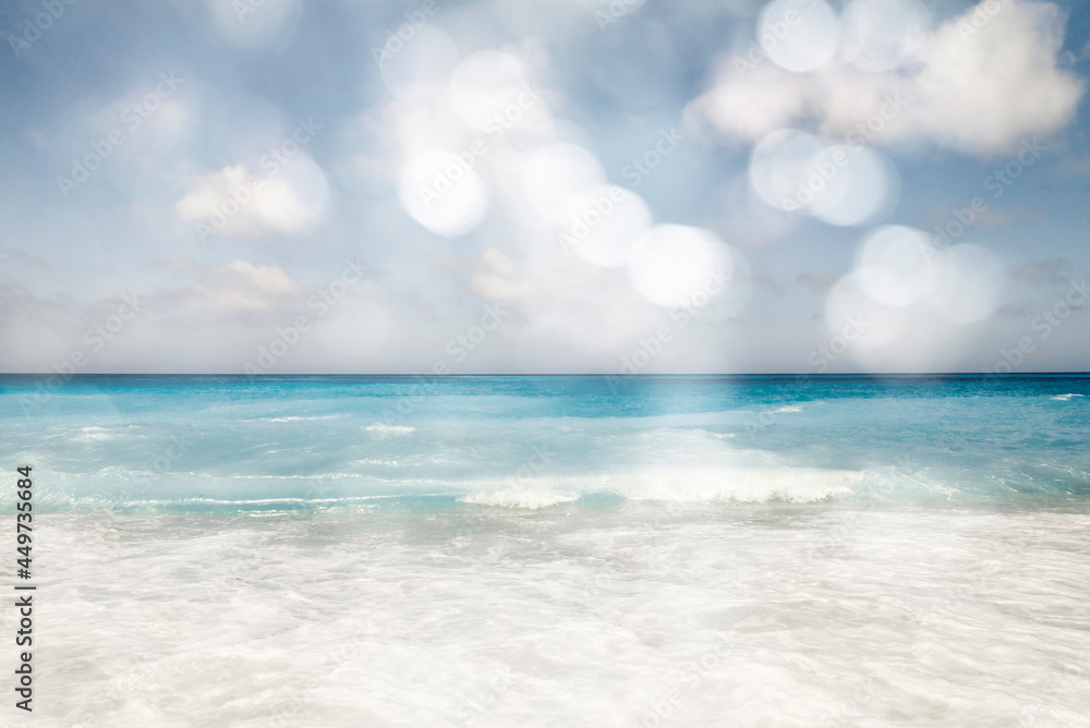 Fototapeta premium blurred beach and sea waves with bokeh lights, abstract summer background