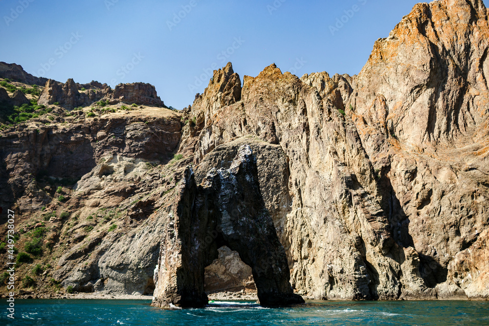 view from the sea to the golden gate near the extinct volcano karadag
