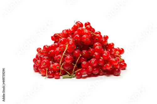 Tasty red currant isolated on white background.