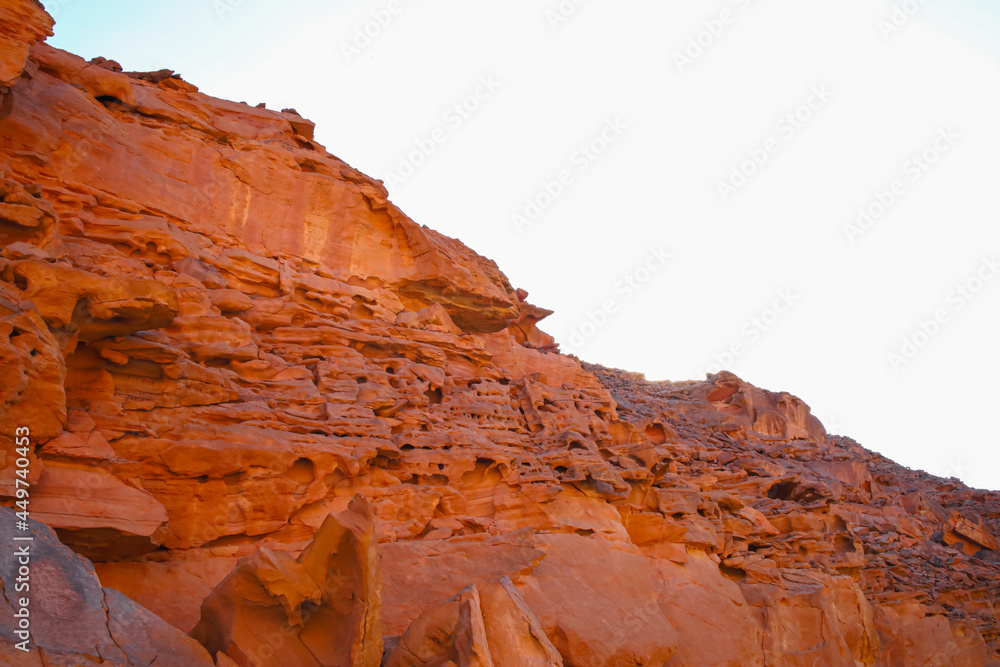 the red rocks of the canyon which is located in the desert
