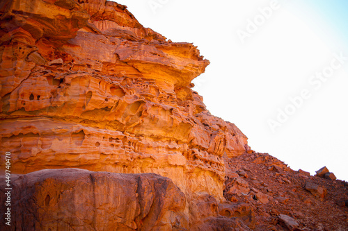 the gorge of the red mountain canyon which is located in the desert