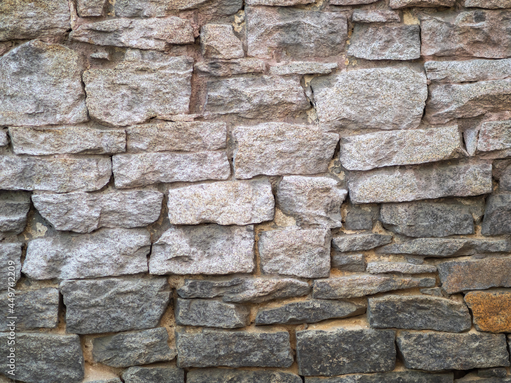 Backgrounds of the old fortress wall. Ancient historic Genoese castle or fortress