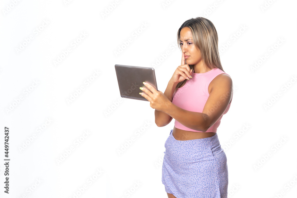 Super happy girl holding a tablet isolated on white background Super happy girl holding a tablet isolated on white background