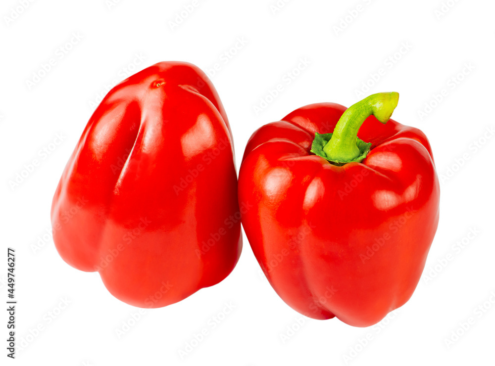 Two red bell peppers isolated on white background. Two red bell peppers isolated on white background.