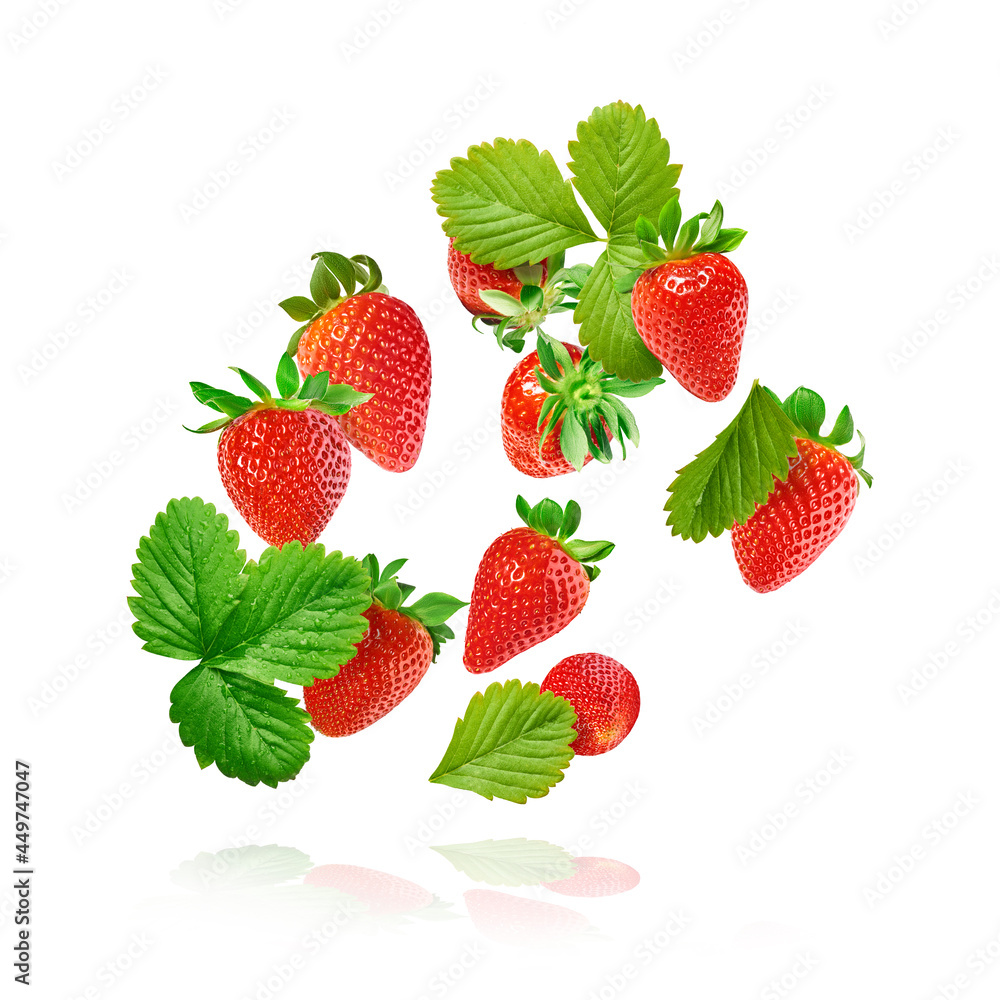 Fresh raw ripe strawberry with green leaves falling in the air, food levitation Fresh raw ripe strawberry with green leaves falling in the air, food levitation
