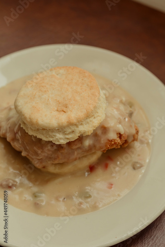 Southern-style smothered fried chicken biscuit
