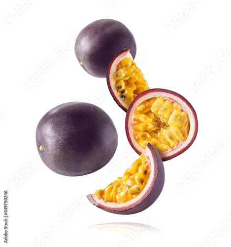 Fresh ripe passion fruit falling in the air photo