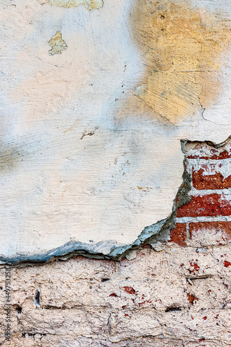 Grunge background. Grunge painted plaster cement wall texture background. Old wall backdrop texture. Detail cracked wall