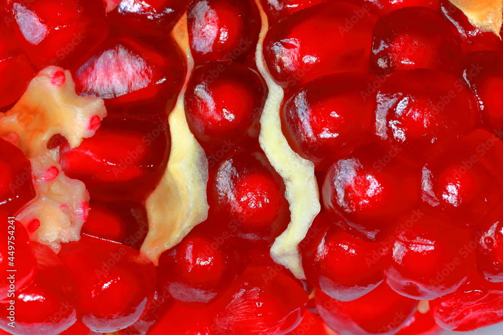 Pomegranate seeds, macro. Fruit of a juicy pomegranate in a cut. Fruit background
Pomegranate seeds, macro. Fruit of a juicy pomegranate in a cut. Fruit background