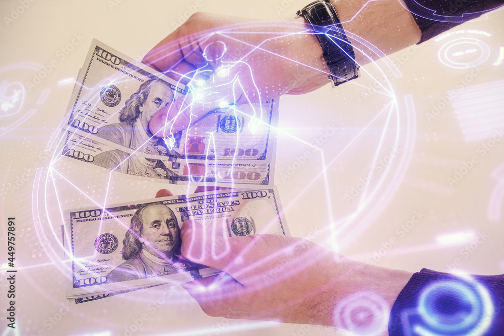 Multi exposure of education theme drawing hologram and USA dollars bills and man hands. Multi exposure of education theme drawing hologram and USA dollars bills and man hands.