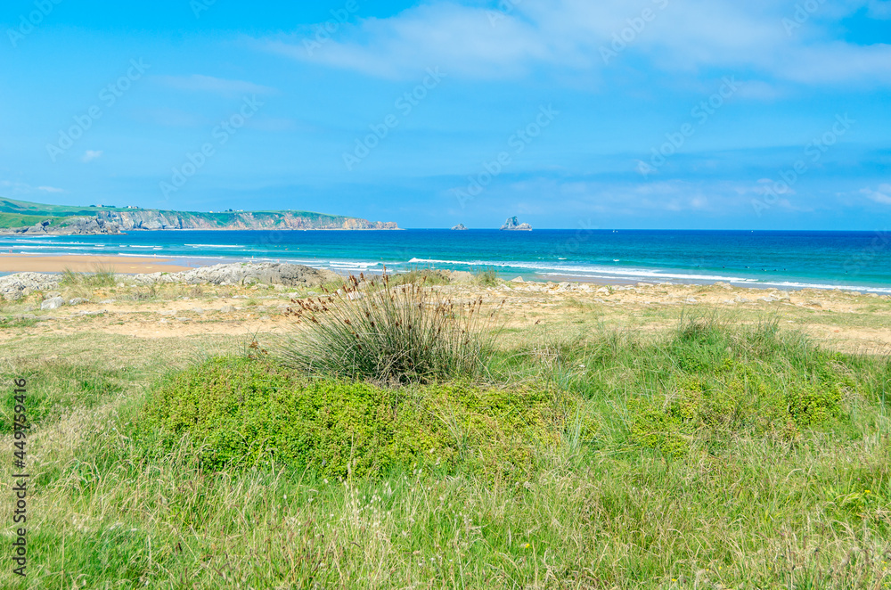 View of the dunes and rocky beach in Cantabria, northern Spain