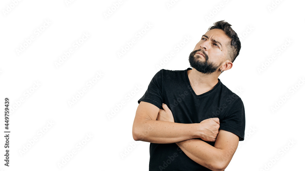 Fototapeta premium man in black shirt pensive with arms crossed on white background