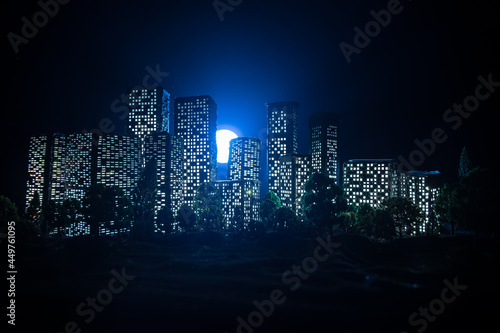 Cartoon style city buildings. Realistic city building miniatures with lights. background.