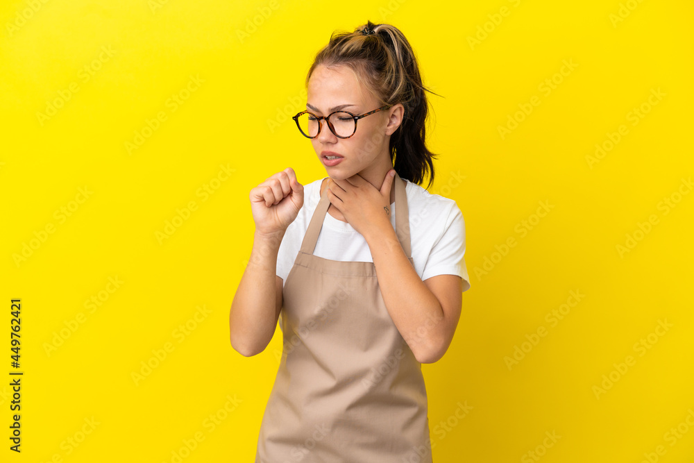 Restaurant waiter Russian girl isolated on yellow background is suffering with cough and feeling bad Restaurant waiter Russian girl isolated on yellow background is suffering with cough and feeling bad