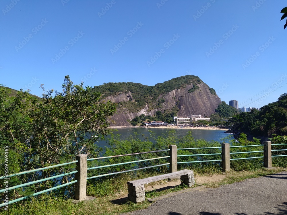 Beautiful landscape with beach, trees and mountains. City of Rio de Janeiro.