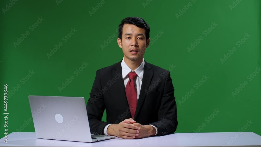 Green Screen Background: Live News Studio With Professional Asian Male Anchor Reporting On The Events Of The Day. Television Channel Newsroom Concept. Chroma Key Template Background
Green Screen Background: Live News Studio With Professional Asian Male Anchor Reporting On The Events Of The Day. Television Channel Newsroom Concept. Chroma Key Template Background