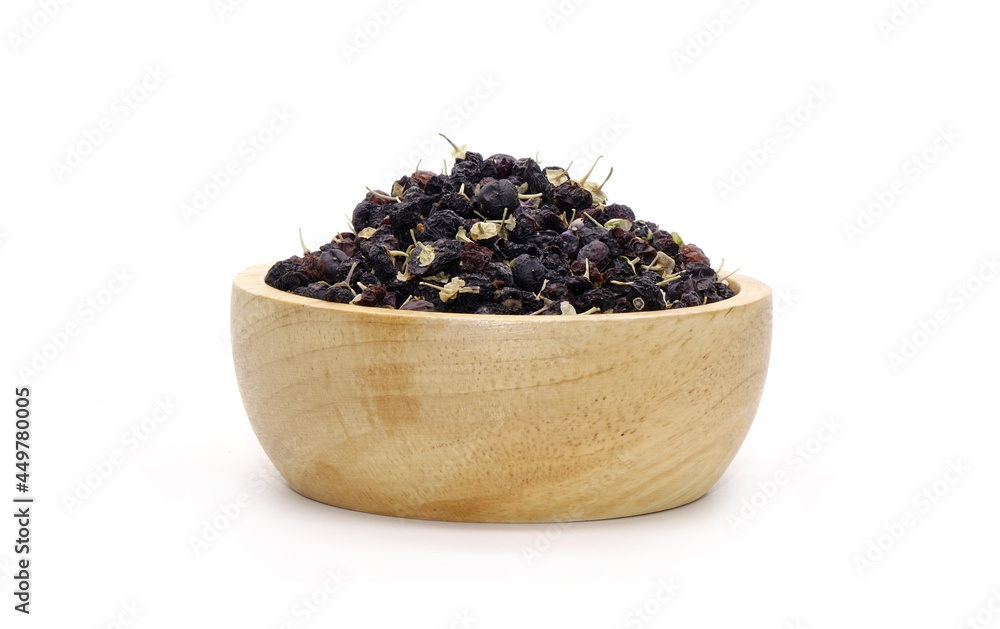 Black wolfberry in wooden bowl isolated on white background. Commonly known as black fruit wolfberry, goji nero, siyah goji. Used in traditional Chinese medicine, herbal tea Black wolfberry in wooden bowl isolated on white background. Commonly known as black fruit wolfberry, goji nero, siyah goji. Used in traditional Chinese medicine, herbal tea