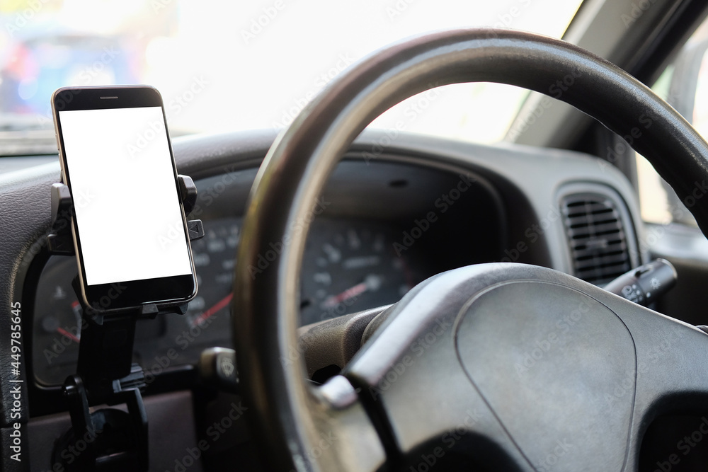 Mock up smart phone on holder in car