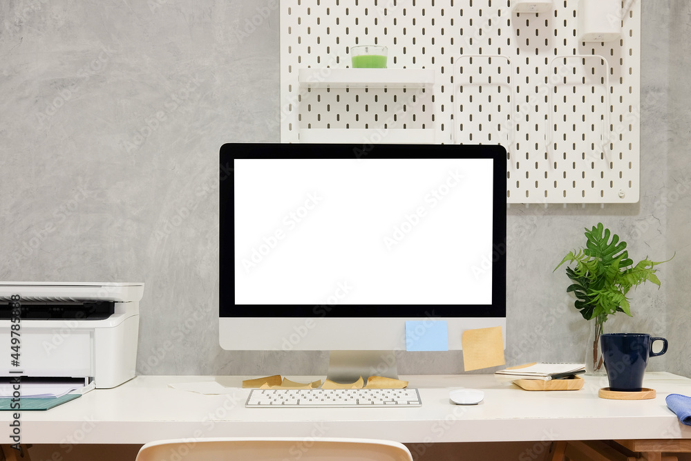 Creative workspace with computer, houseplant and office supplies on white table. Creative workspace with computer, houseplant and office supplies on white table.